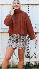 cable knit turtleneck sweater in rust