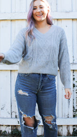 chunky v-neck cable knit in gray