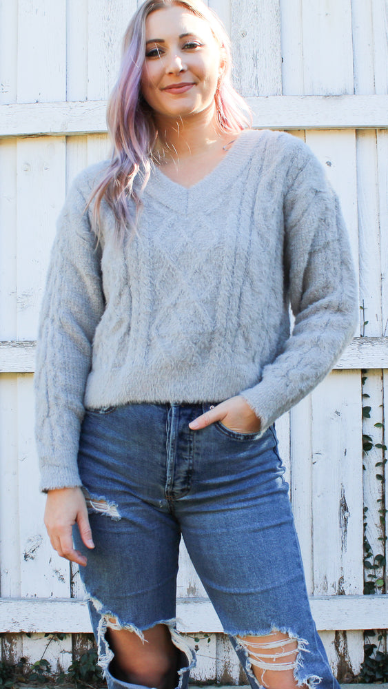 chunky v-neck cable knit in gray