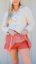 smocked ruffle skirt in coral