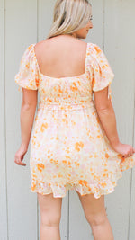 floral print ruffle mini dress in mango/pink